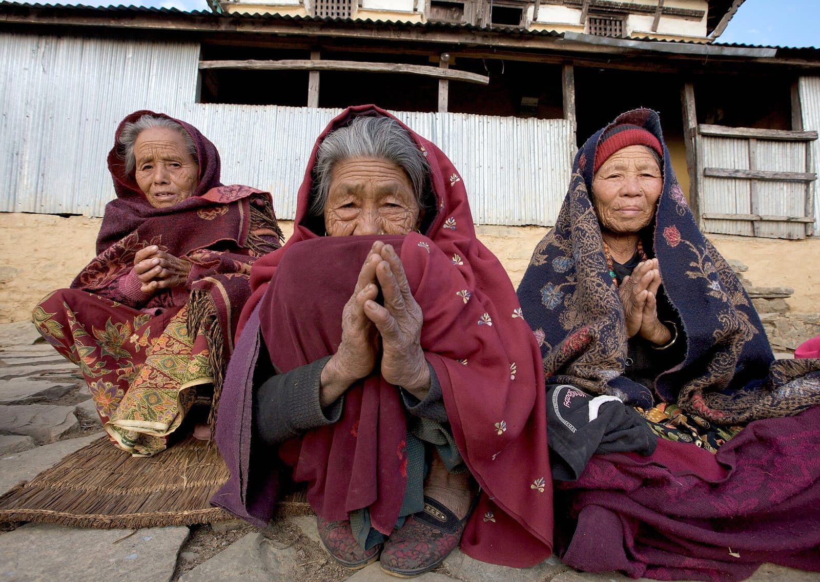 Women from a community group in Nepal sitting together
